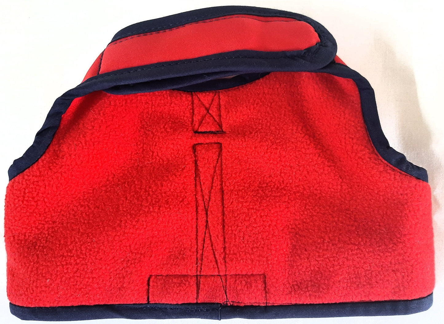 Inside of Softshell harness showing warm fleece lining